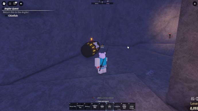 The player approaches a barrel of TNT inside the Forsaken Shores' Skull Cave in Fisch