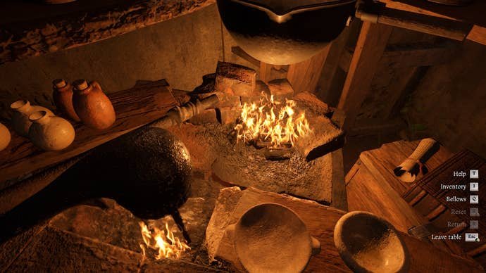A small fire burning on an alchemy bench in Kingdom Come Deliverance 2