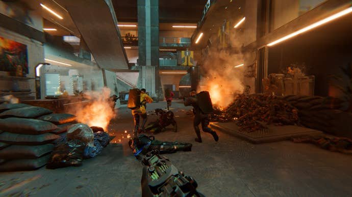 Men in a vault in Den of Wolves - there are sandbags deployed as cover, and explosions in the background.